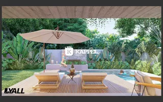 Foto de uma área externa com piscina e paisagismo tropical.