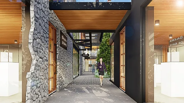 Vista de um corredor moderno com paredes de pedra e detalhes em madeira.