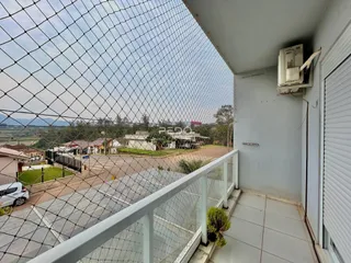 Vista da varanda de um imóvel em Lajeado, Brasil, vista através de uma cerca.