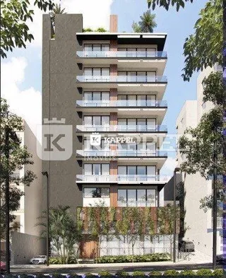 Fachada de um prédio residencial em Lajeado, Brasil, com vários andares e varandas.