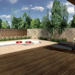 Área externa com deck de madeira e muro de pedra em Lajeado.