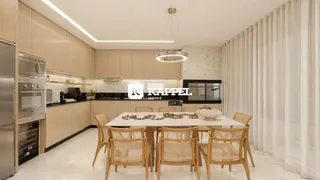 Foto de uma sala de jantar com mesa de madeira e armários claros em um imóvel.