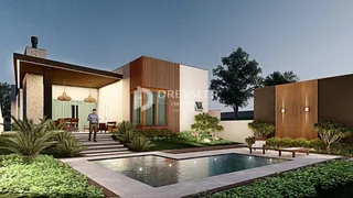Fachada de uma residência moderna com piscina e jardim em Lajeado, Brasil.