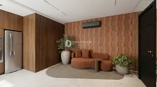 Sala de estar com móveis de madeira e parede de tijolos aparentes.