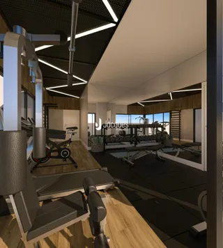 Imagem de uma área comum com equipamentos de ginástica em um imóvel.