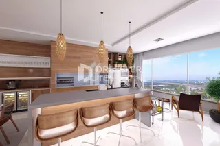 Vista da cozinha moderna com ilha e armários em madeira.