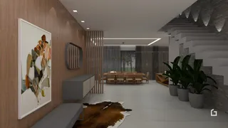 Ambiente interno com painéis de madeira e escadaria em um imóvel.