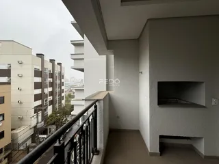 Vista da fachada de um imóvel em Lajeado, Brasil, mostrando uma varanda e o entorno.