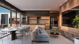 Ambiente moderno de sala de estar, jantar e cozinha em um imóvel.