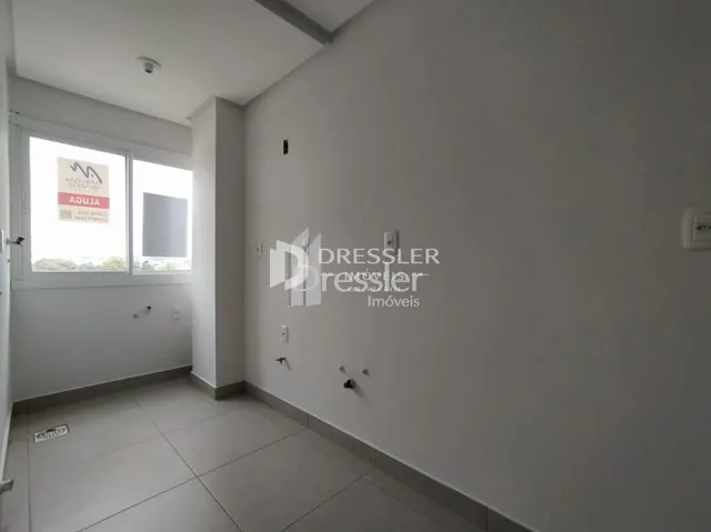 Hall de corredor interno de um imóvel em Lajeado.
