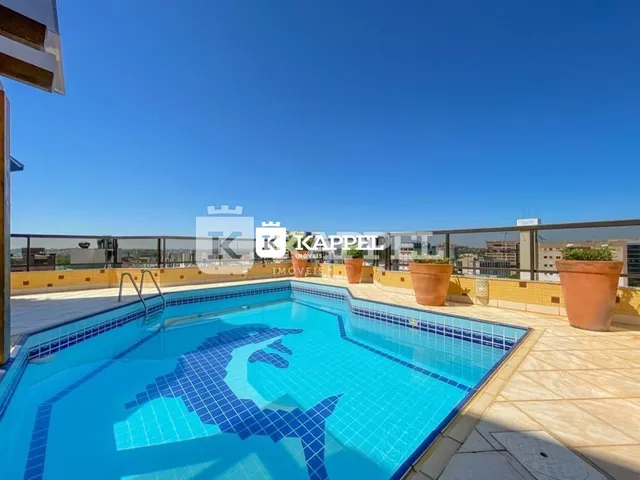 Foto de uma piscina externa em uma propriedade em Lajeado, Brasil.