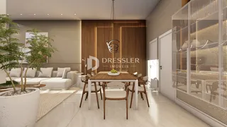 Sala de estar e jantar com decoração moderna em um imóvel no Brasil.