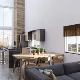Sala de estar com mesa de madeira e sofá em ambiente interno.