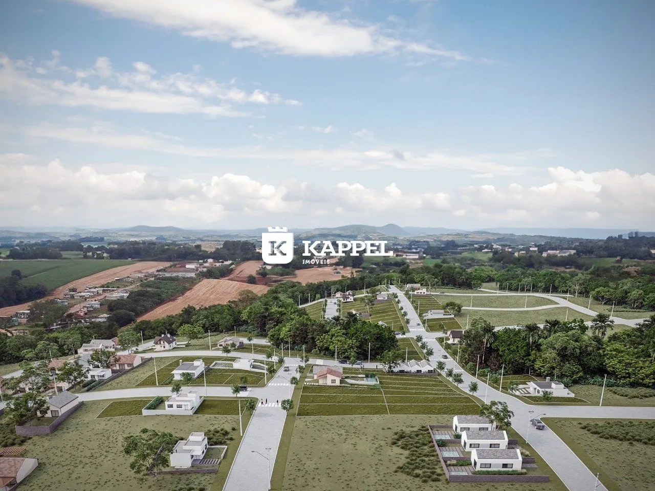 Vista aérea de um loteamento residencial em Lajeado, mostrando casas e áreas verdes.