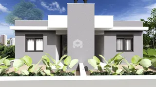Fachada de uma casa moderna com jardim e deck em Lajeado, Brasil.