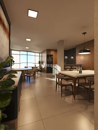 Ambiente moderno com mesas de jantar em um apartamento em Lajeado.
