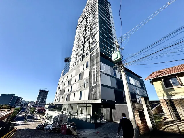 fachada de um prédio residencial moderno em Lajeado, Brasil.