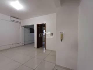 Interior de um corredor de imóvel em Lajeado, Brasil.
