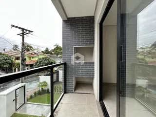 Vista da varanda de uma residência em Lajeado, Brasil, com detalhes arquitetônicos.