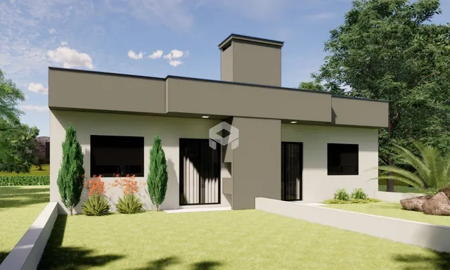 Fachada de uma casa moderna em Lajeado, Brasil com jardim frontal.