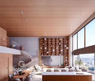 Sala de estar moderna com pé direito alto e vista panorâmica.