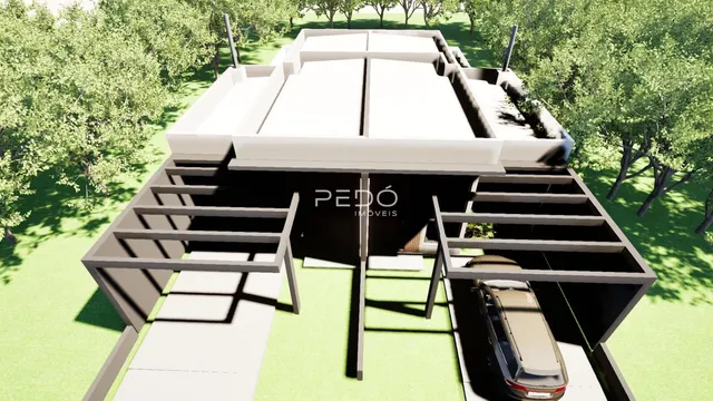 Vista externa de uma estrutura de casa com cobertura em um ambiente arborizado.