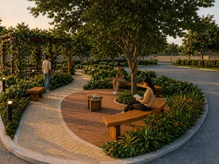 Jardim com bancos de madeira e paisagismo ao pôr do sol.