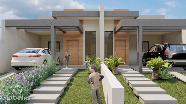 Fachada de uma casa moderna em Lajeado, Brasil, com jardim e paisagismo.