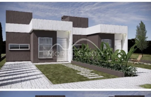 Fachada de uma casa moderna com paisagismo frontal em Lajeado, Brasil.