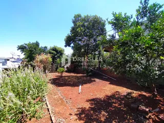 Vista externa do jardim de uma propriedade em Lajeado.