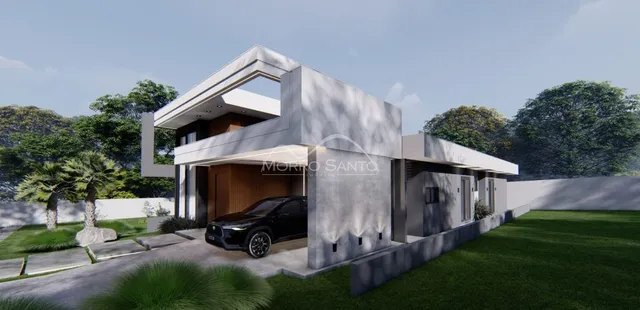 Fachada moderna de uma casa residencial em Lajeado, Brasil, com paisagismo verde.
