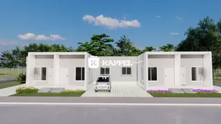 Fachada externa de uma residência moderna em Lajeado, Brasil, com paisagismo frontal.