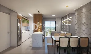 Ambiente moderno com cozinha e sala de estar em um imóvel no Brasil.