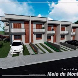 Fachada moderna de uma casa residencial em Lajeado, Brasil, com varandas e paisagismo.