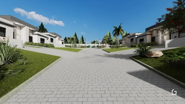 Vista externa de duas residências modernas com paisagismo em Lajeado, Brasil.