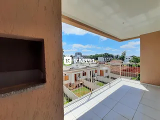 Vista de um terraço com piso de cerâmica em um apartamento em Lajeado.
