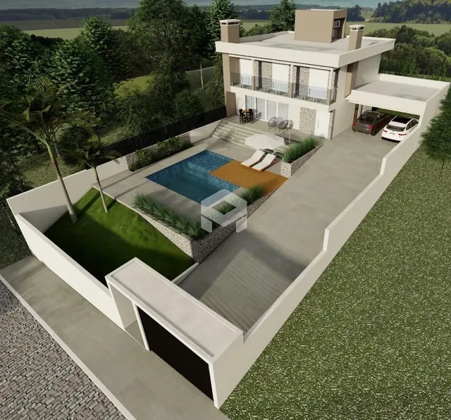 Vista externa de uma residência moderna com piscina e jardim em Lajeado.