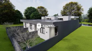 Fachada de uma casa moderna com jardim bem cuidado em Lajeado.