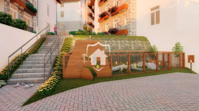 Vista externa de uma residência com escadaria e jardim.