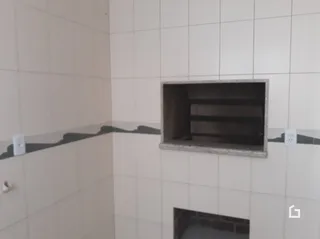 Parede com nicho em revestimento cerâmico de uma propriedade em Lajeado.