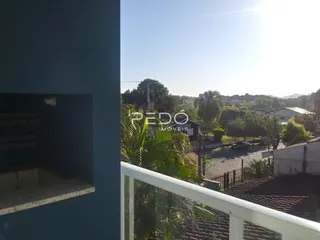 Vista da varanda com grade de segurança em Lajeado, Brasil.