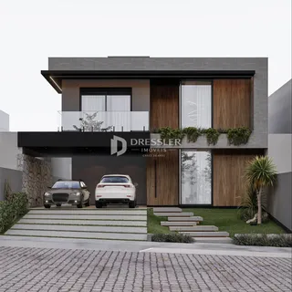 Fachada moderna de uma residência em Lajeado, Brasil, com jardim e garagem.