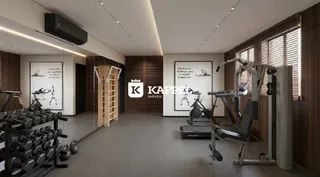 Foto de uma sala de academia equipada com máquinas de musculação.