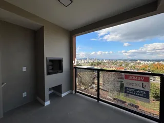 Vista da varanda de um imóvel em Lajeado, Brasil, com vista para a paisagem urbana.