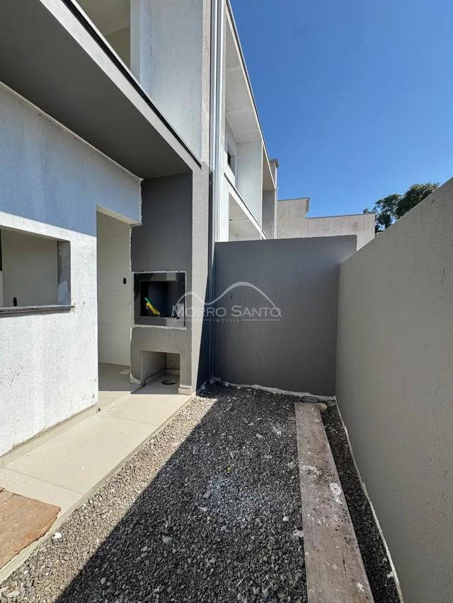 Vista externa da fachada de um prédio residencial em Lajeado, Brasil.