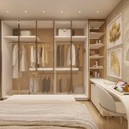 Quarto com cama e estantes embutidas.