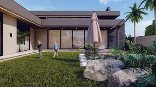 Fachada moderna de uma residência com jardim e paisagismo em Lajeado.