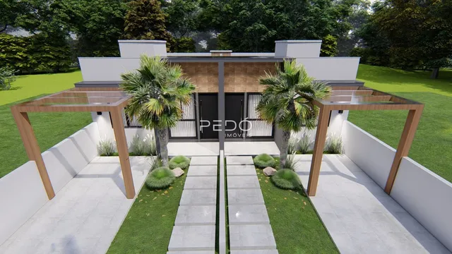 Fachada de uma residência moderna com jardim e área externa em Lajeado.