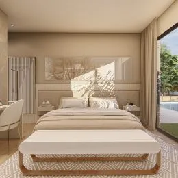 Foto de um quarto com cama grande e roupa de cama branca.