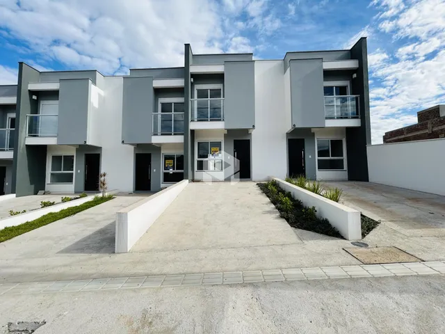 Fachada de um prédio residencial moderno com balcões em Lajeado, Brasil.